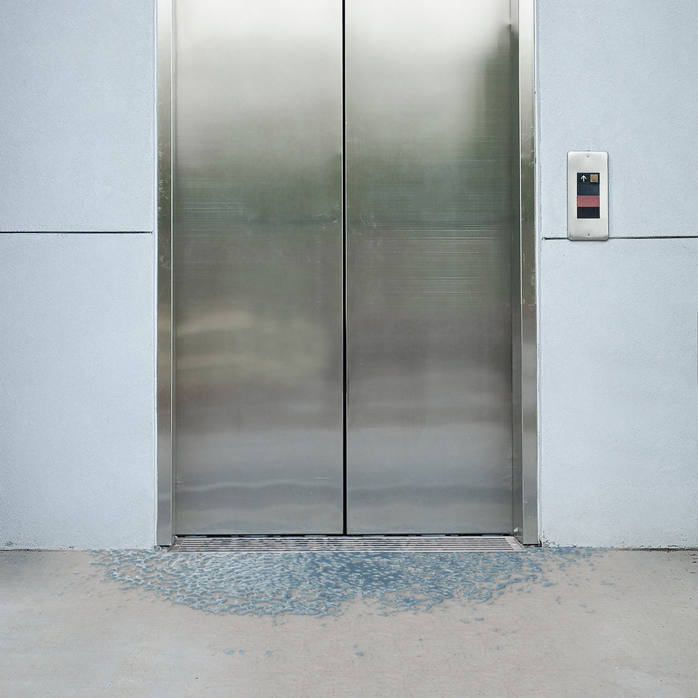Elevator Drain System